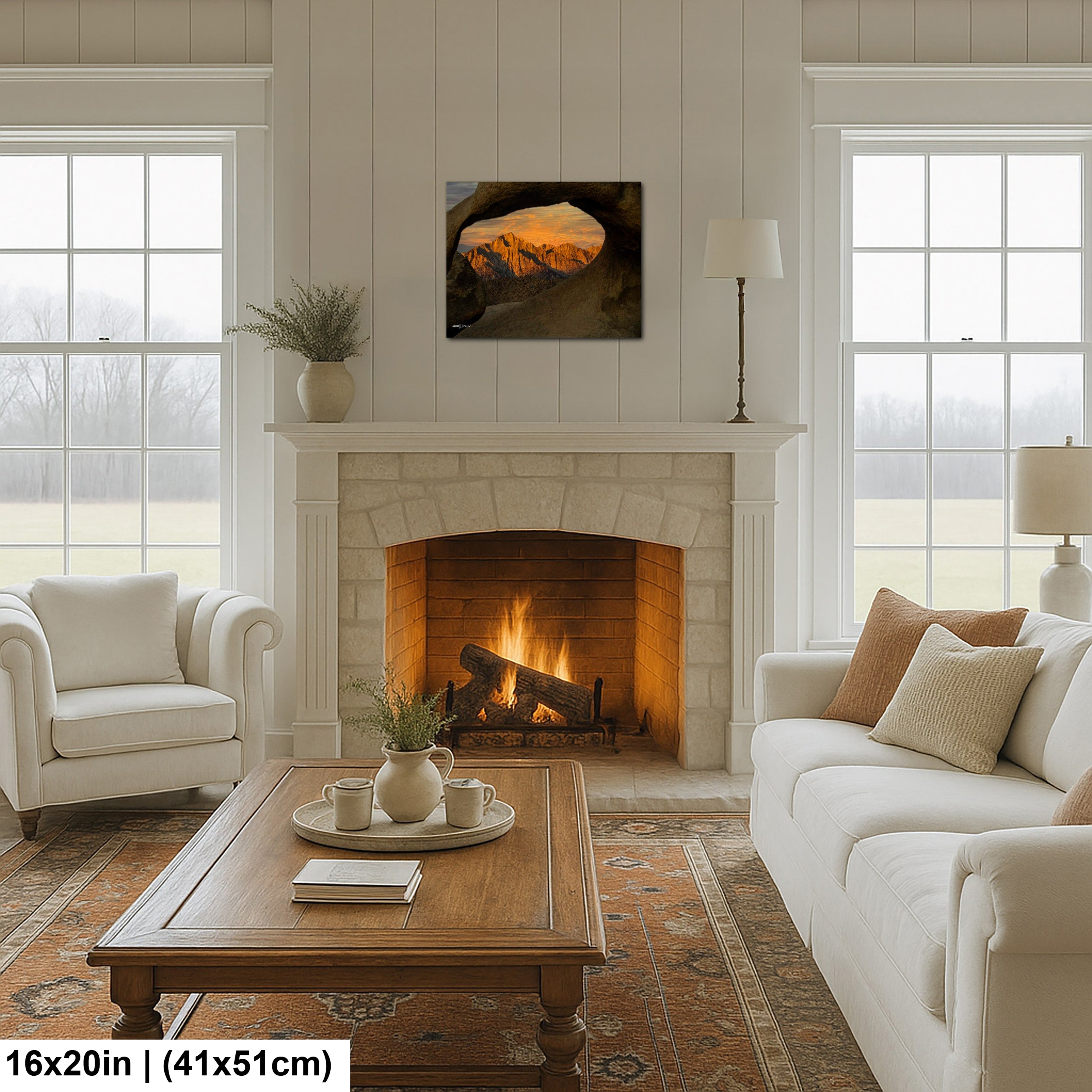Joshua Tree sunset framed through granite rock window canvas above fireplace in modern farmhouse living room.